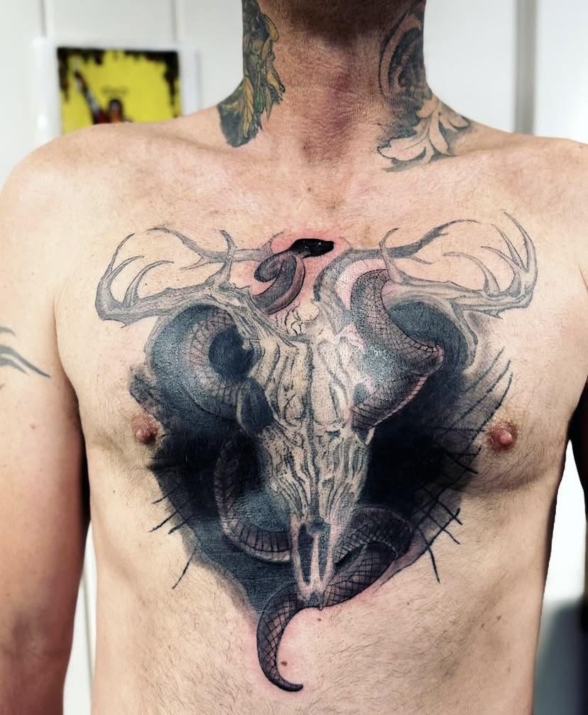 Intricate Skulls and Serpent Tattoo Design