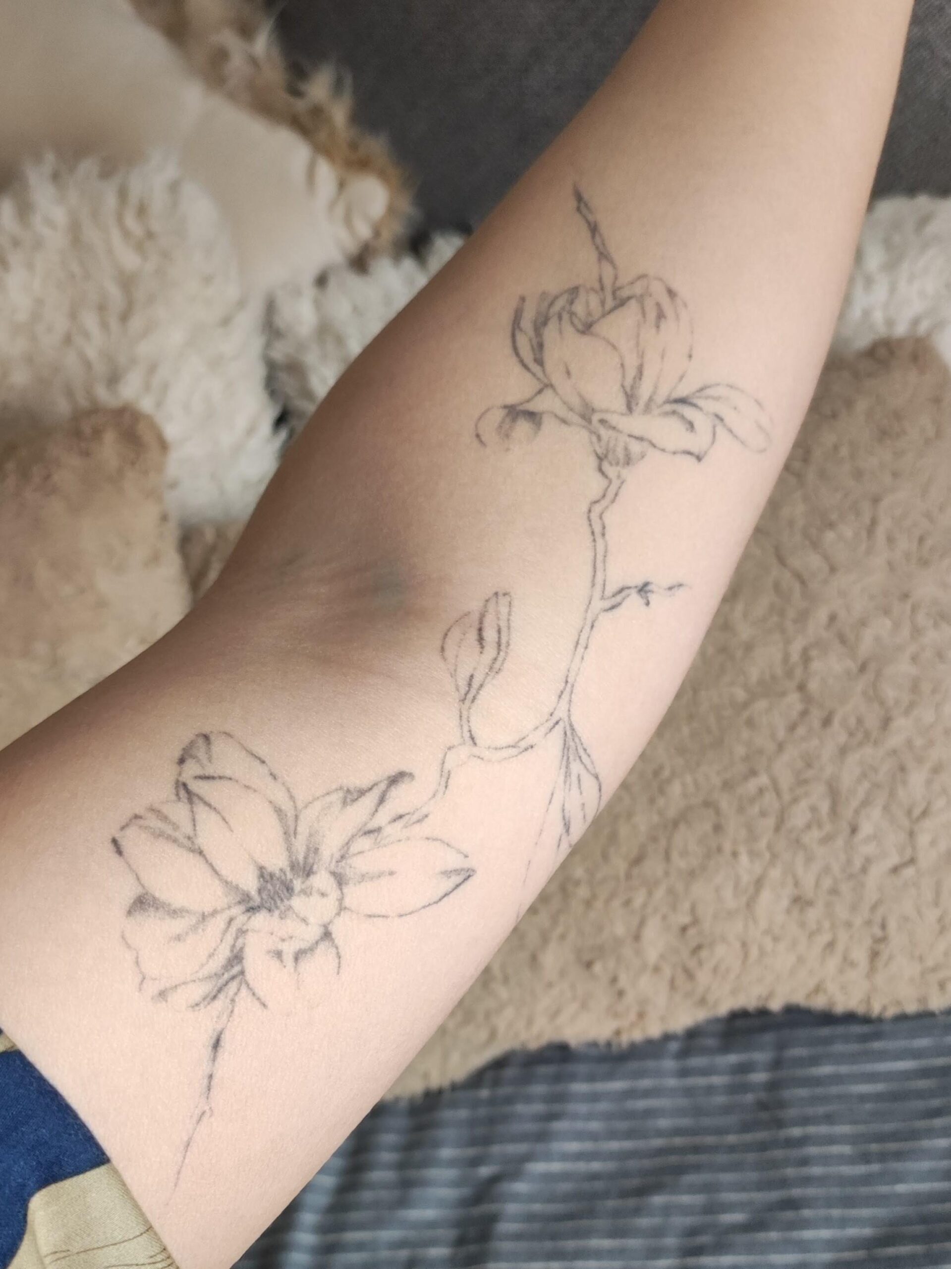 Delicate Fine Line Flower Tattoo