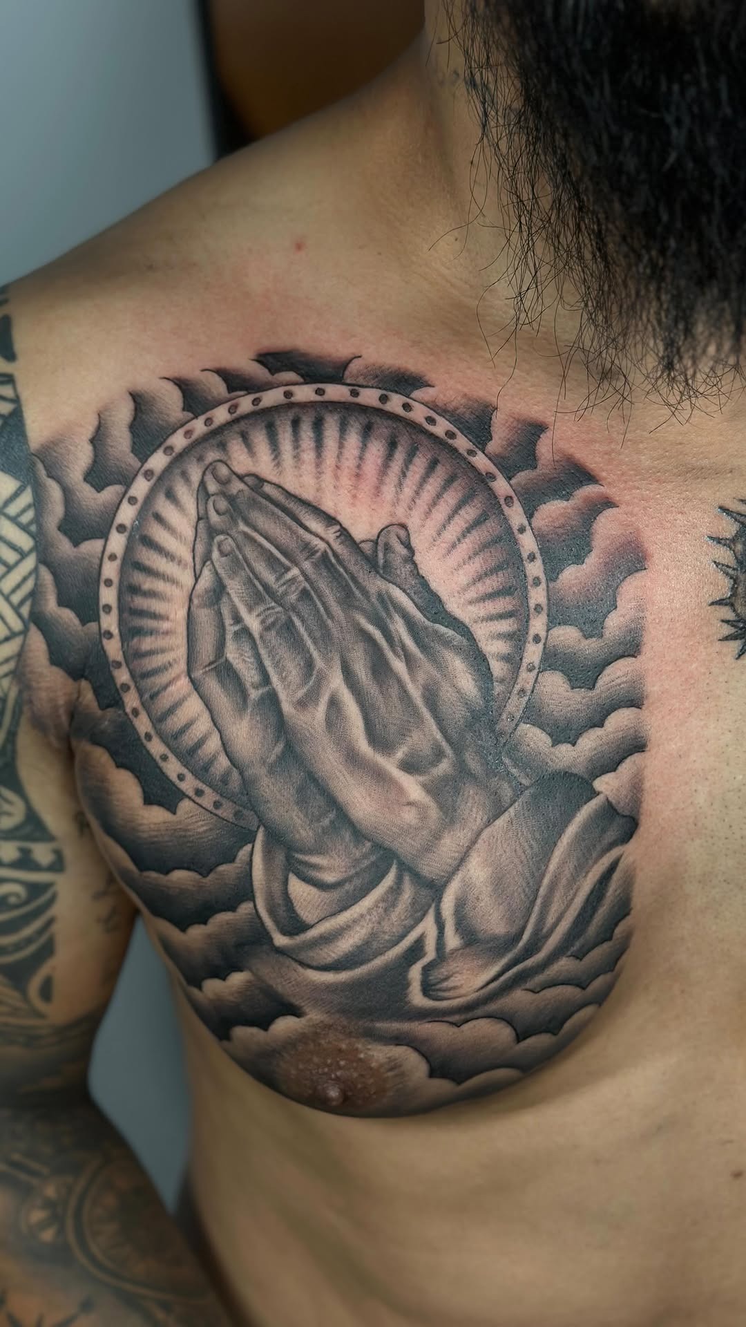 Classic praying hands chest piece