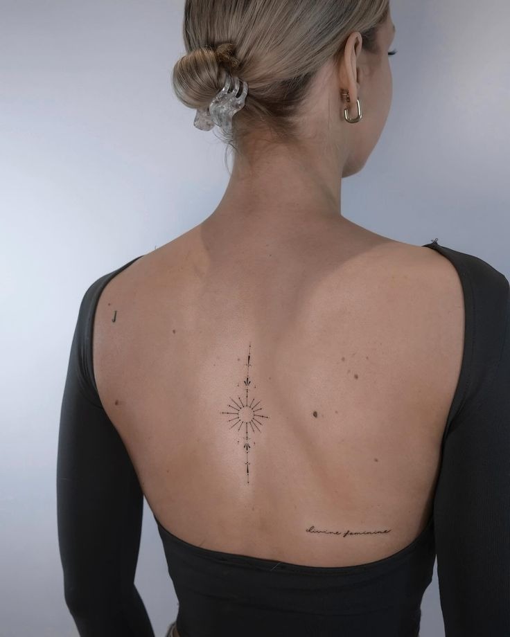 Elegant Spine Duality Tattoo