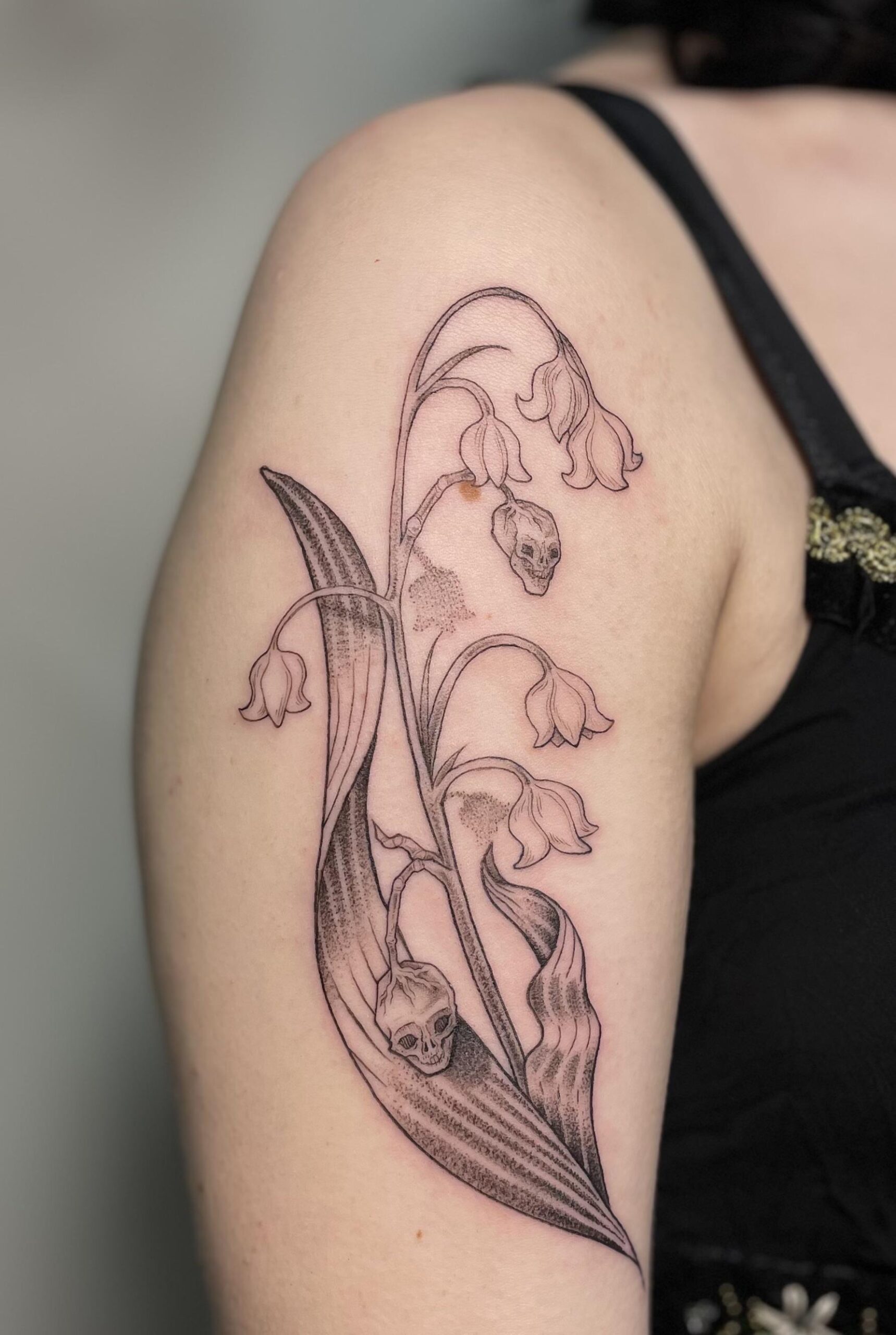 Delicate Fine-Line Lily of the Valley Tattoo