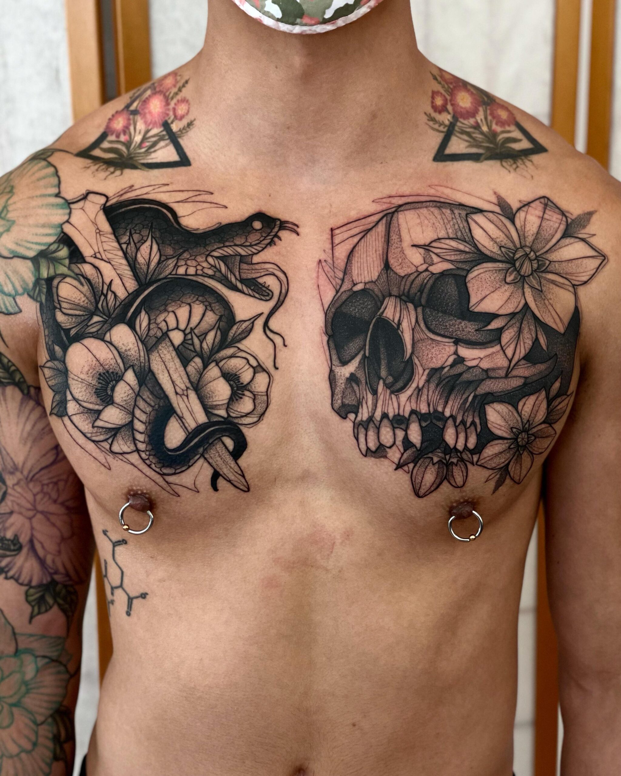 Detailed Floral and Skull Chest Art