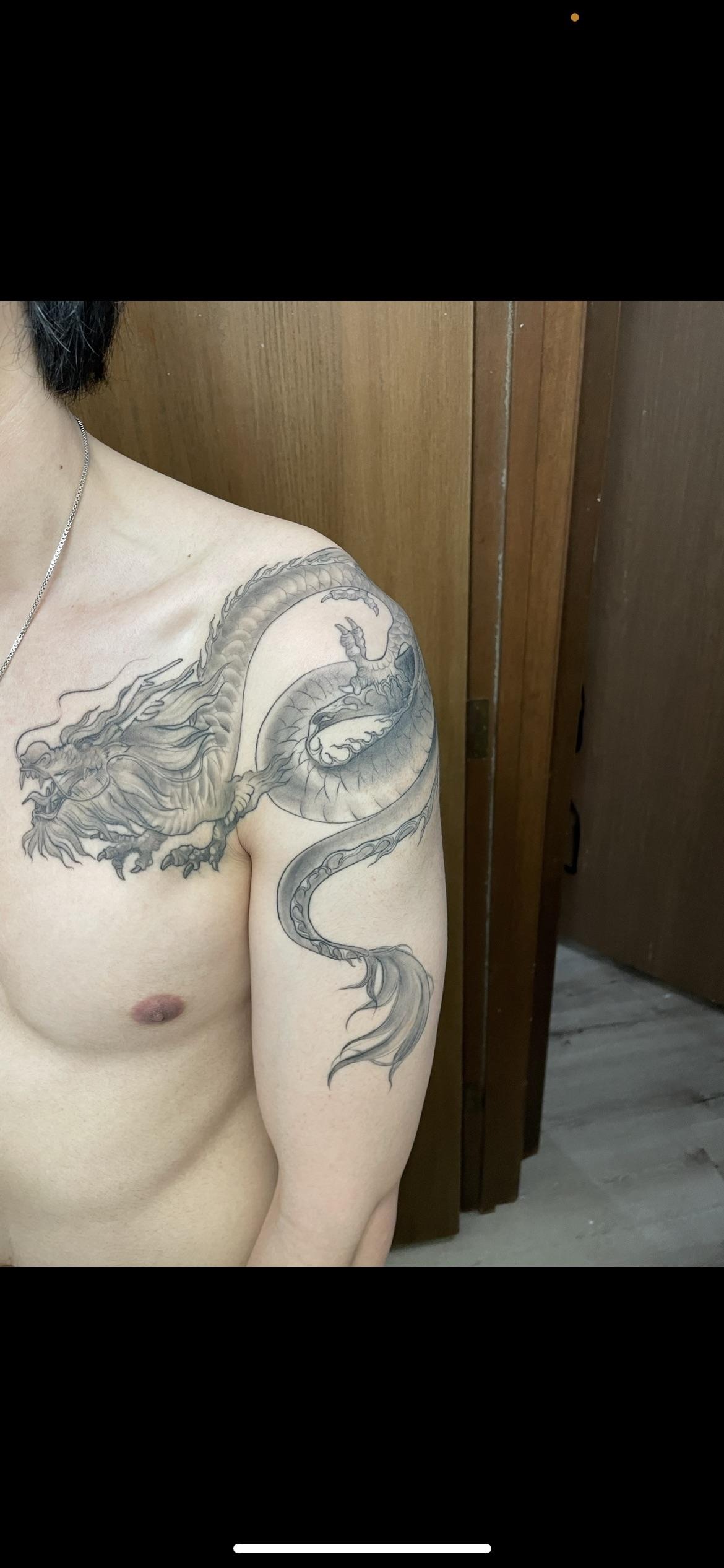 Classic Dragon Shoulder and Pec Tattoo