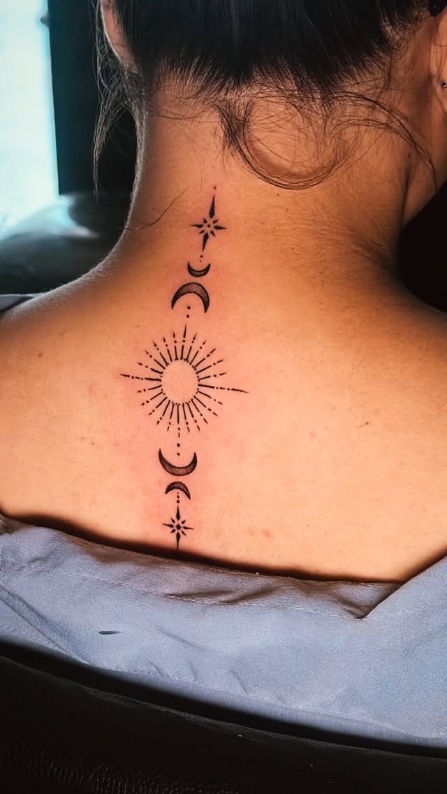 Intricate Spinal Celestial Alignment Tattoo