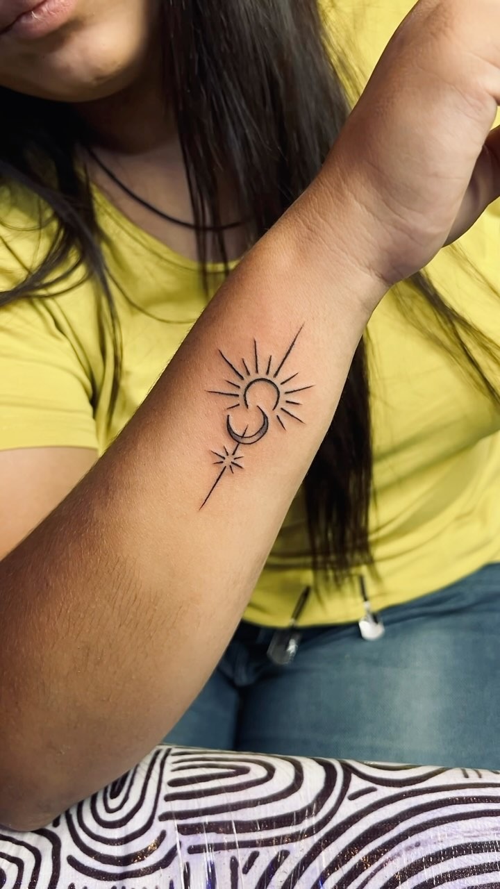 Delicate Celestial Wrist Tattoo
