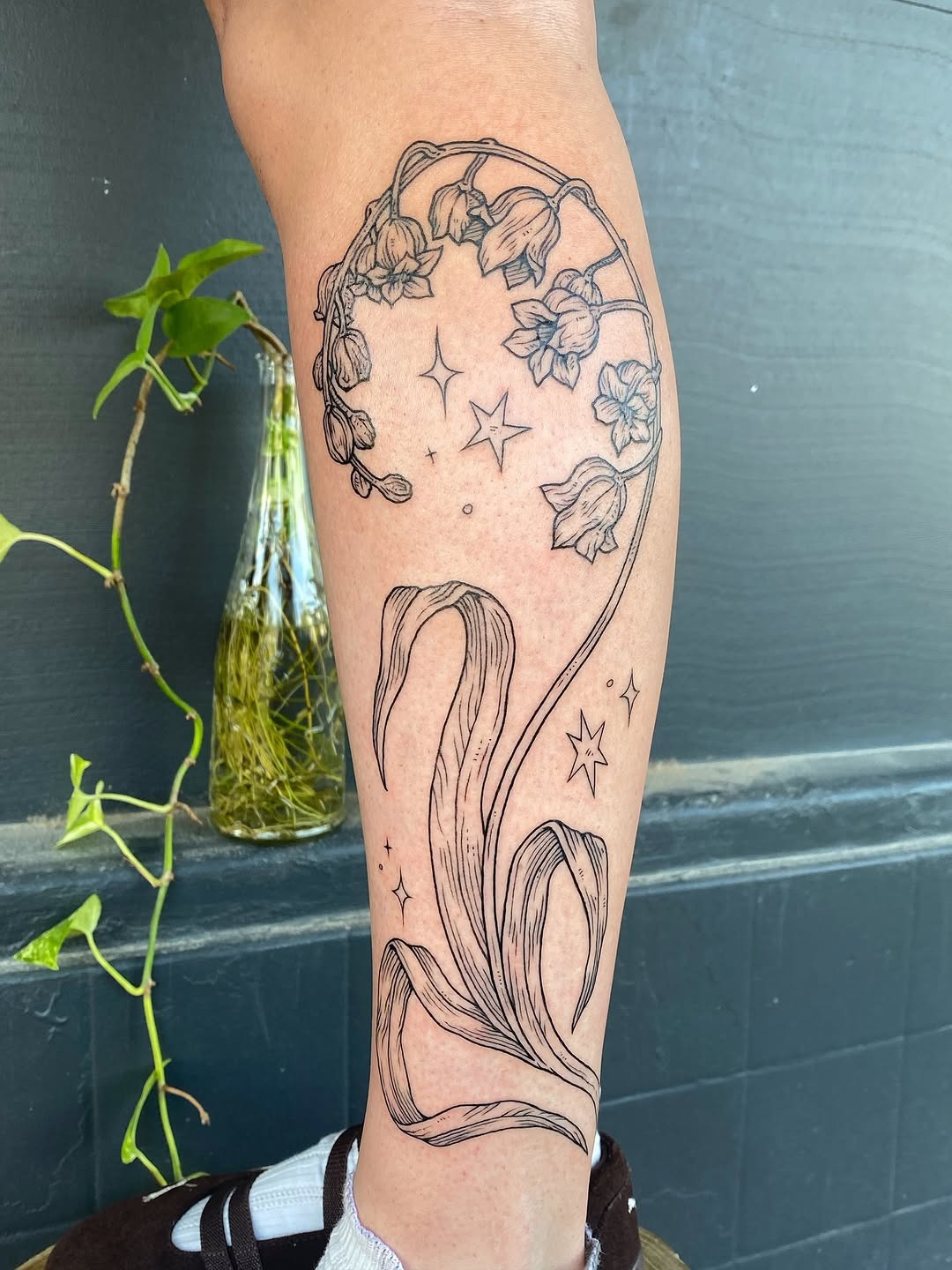 Whimsical Celestial Lily of the Valley Tattoo