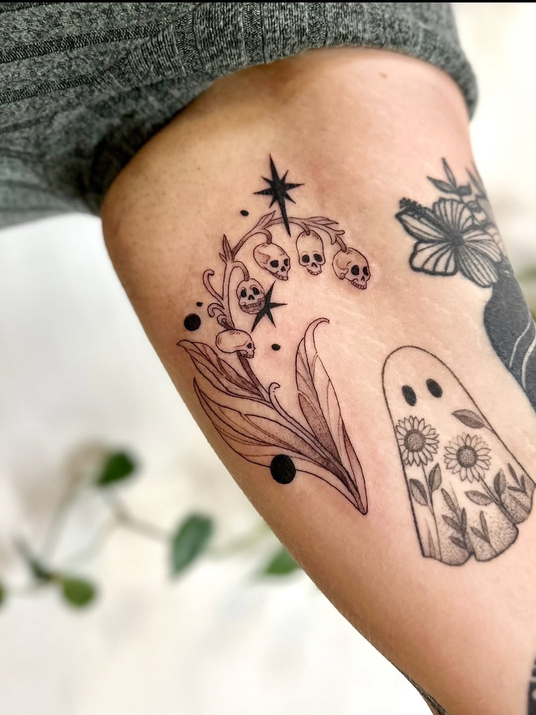 Spooky-Cute Floral and Ghost Tattoo Design