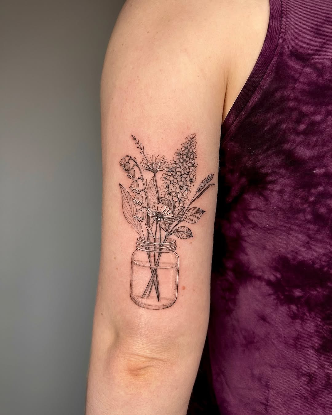 Charming Bouquet of Flowers in a Jar Tattoo