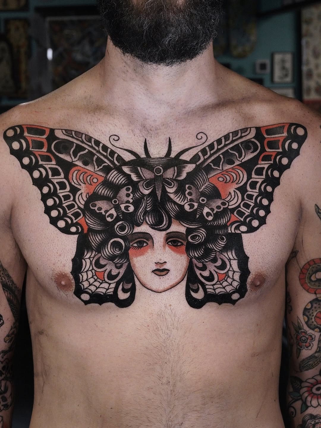 Bold Butterfly Chest Tattoo