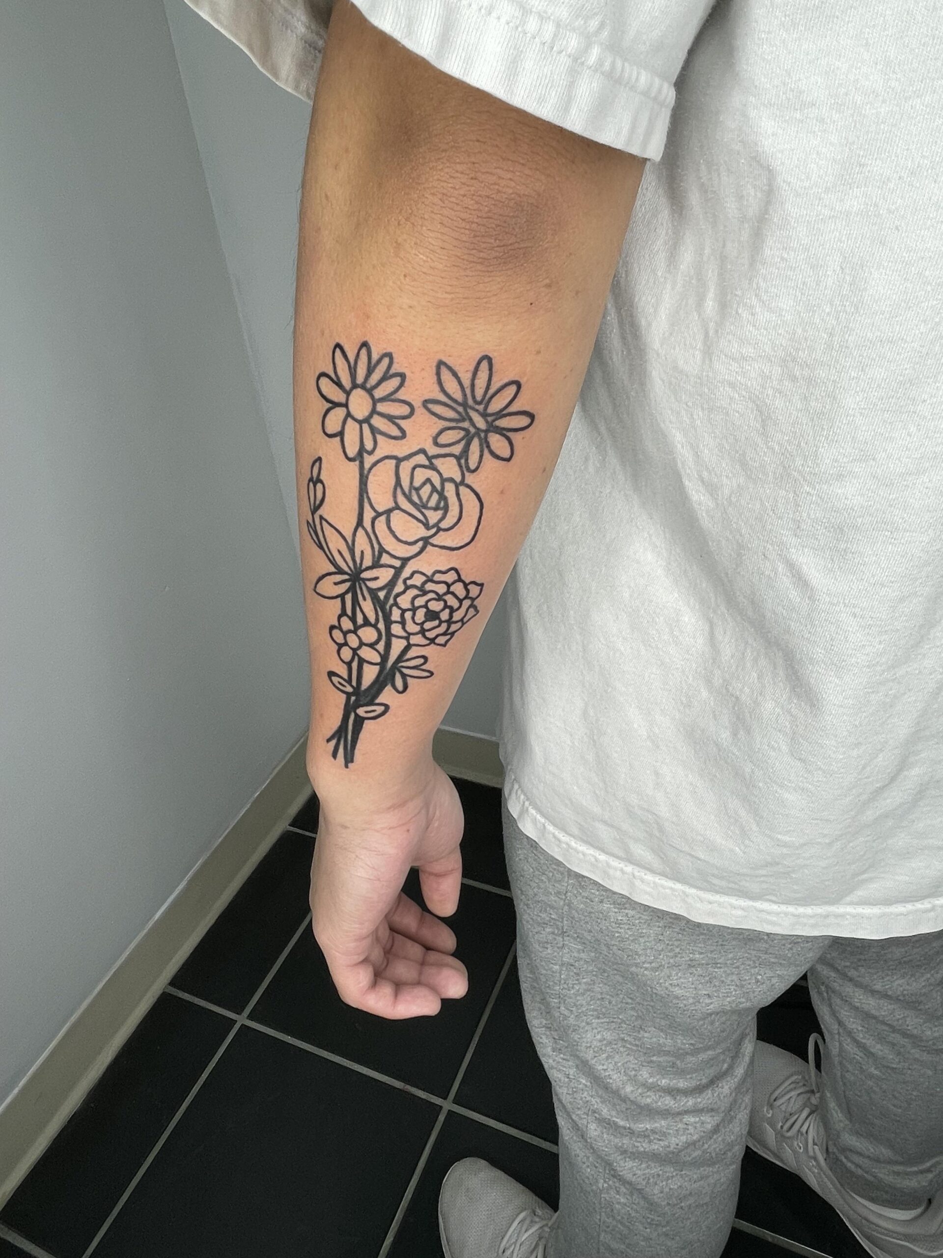 Minimalist Floral Forearm Tattoo