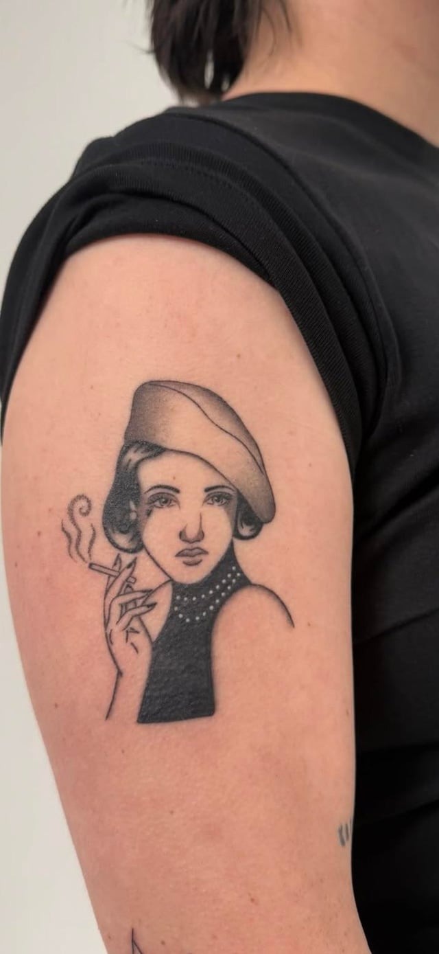Minimalist Traditional Portrait Tattoo