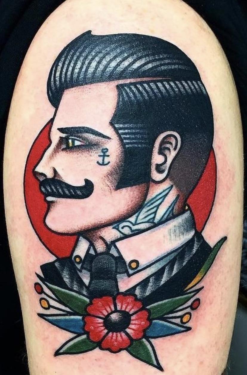 Bold Neo-Traditional Male Portrait Tattoo