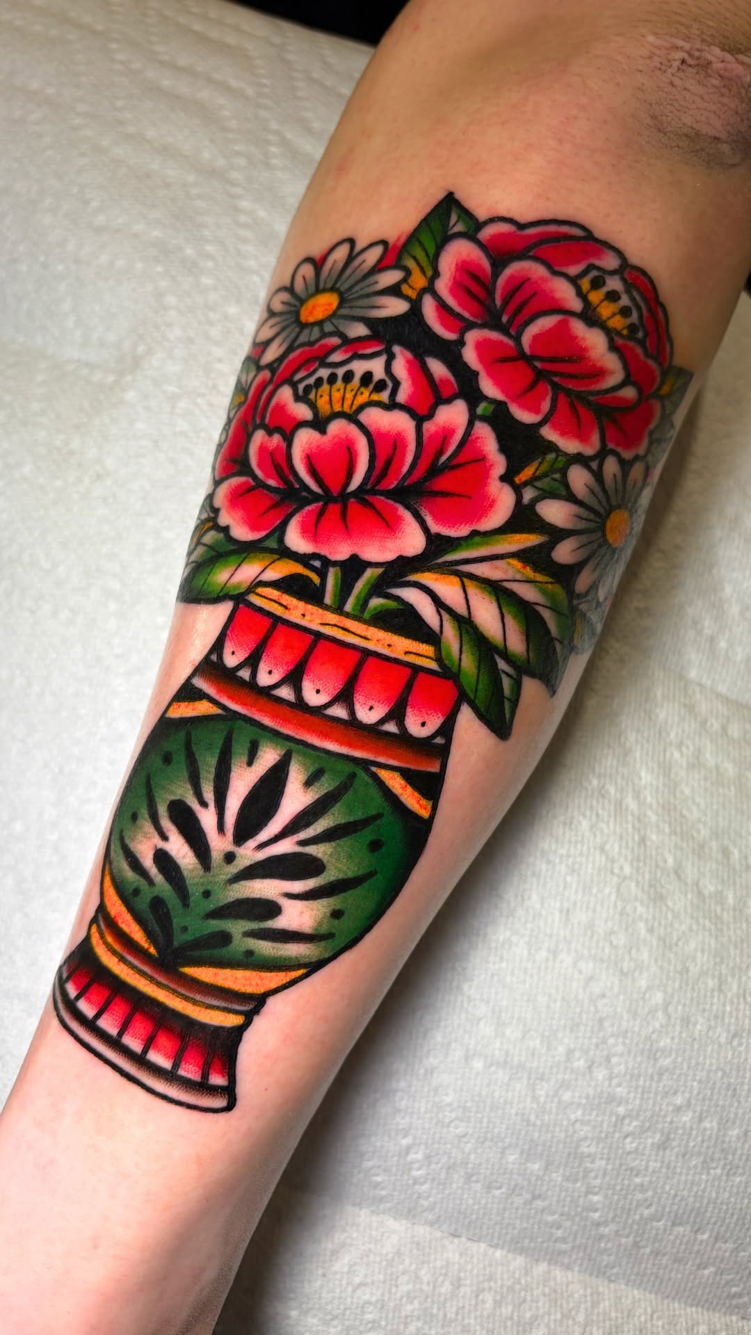 Vibrant Traditional Floral Tattoo